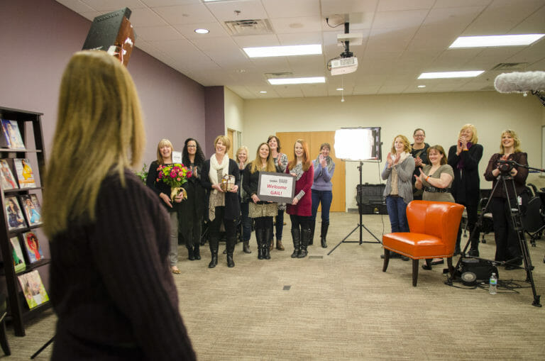 Several Monroe and Main staff members welcomed winner, Gail.