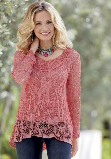 Woman in soft rose lace shirt and jeans