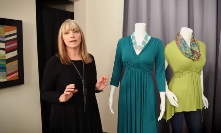 Fashion designer with examples of flattering style tops and dresses