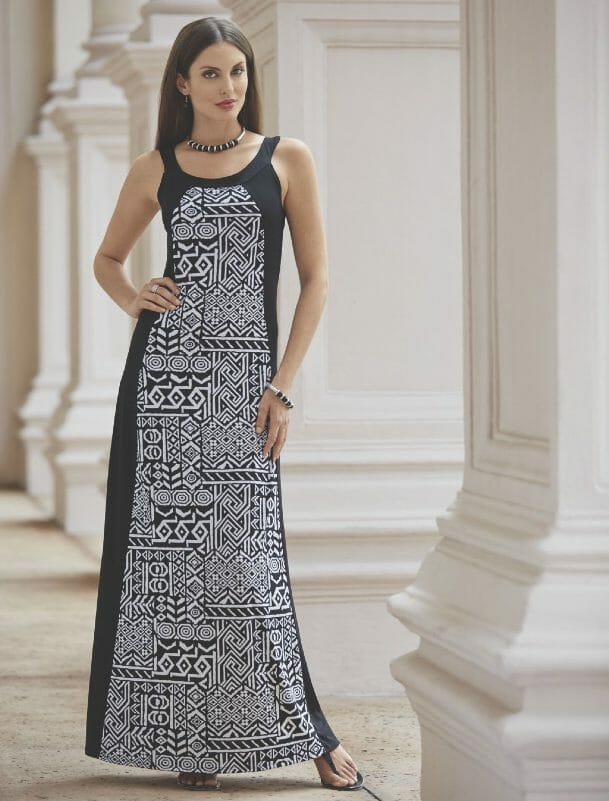 Maxi Dress from Monroe and Main Woman in black and white maxi dress and black thongs