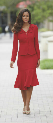Woman in red ruffle suit and sliver sandals