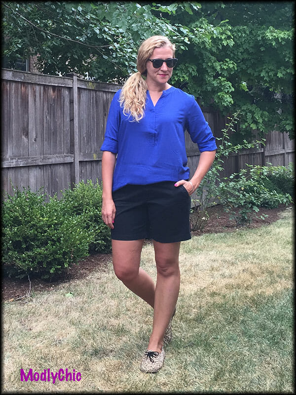 woman wearing a cobalt blue tunic 