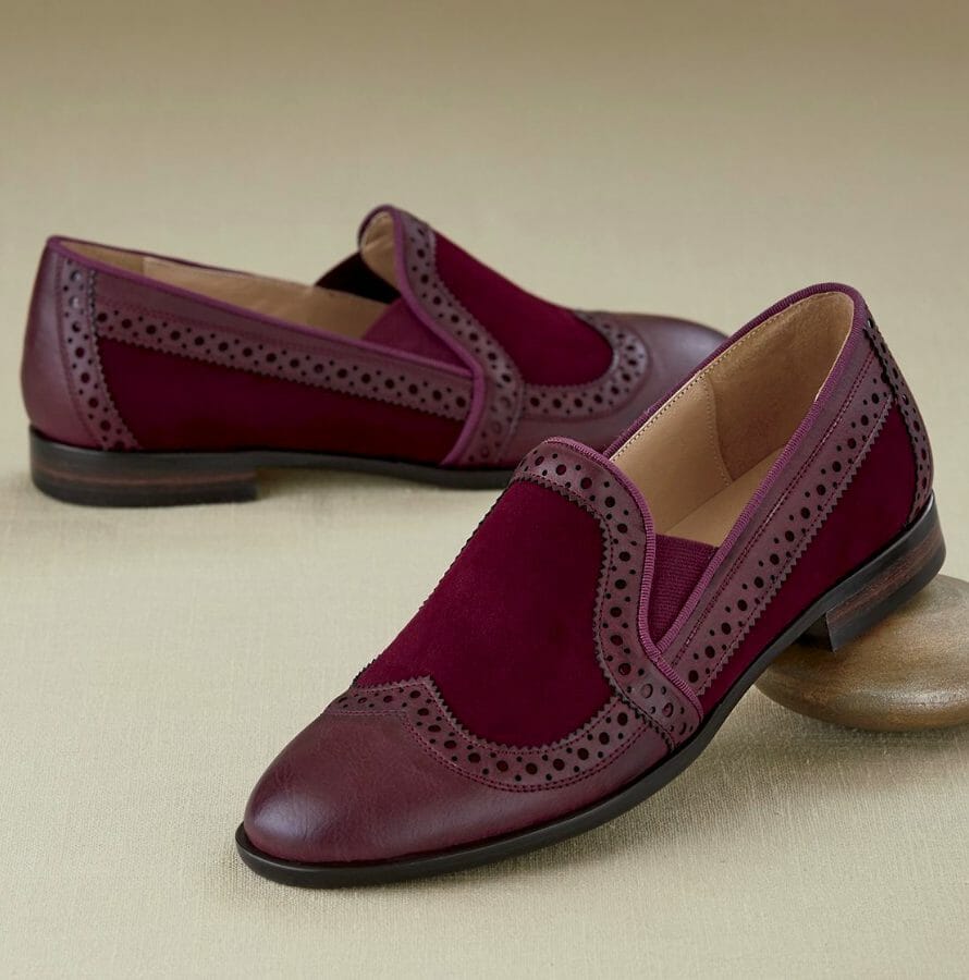 Red loafer with cut-out details along edges