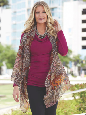 Woman in black pants, multi-colored sheer scarf vest over maroon top