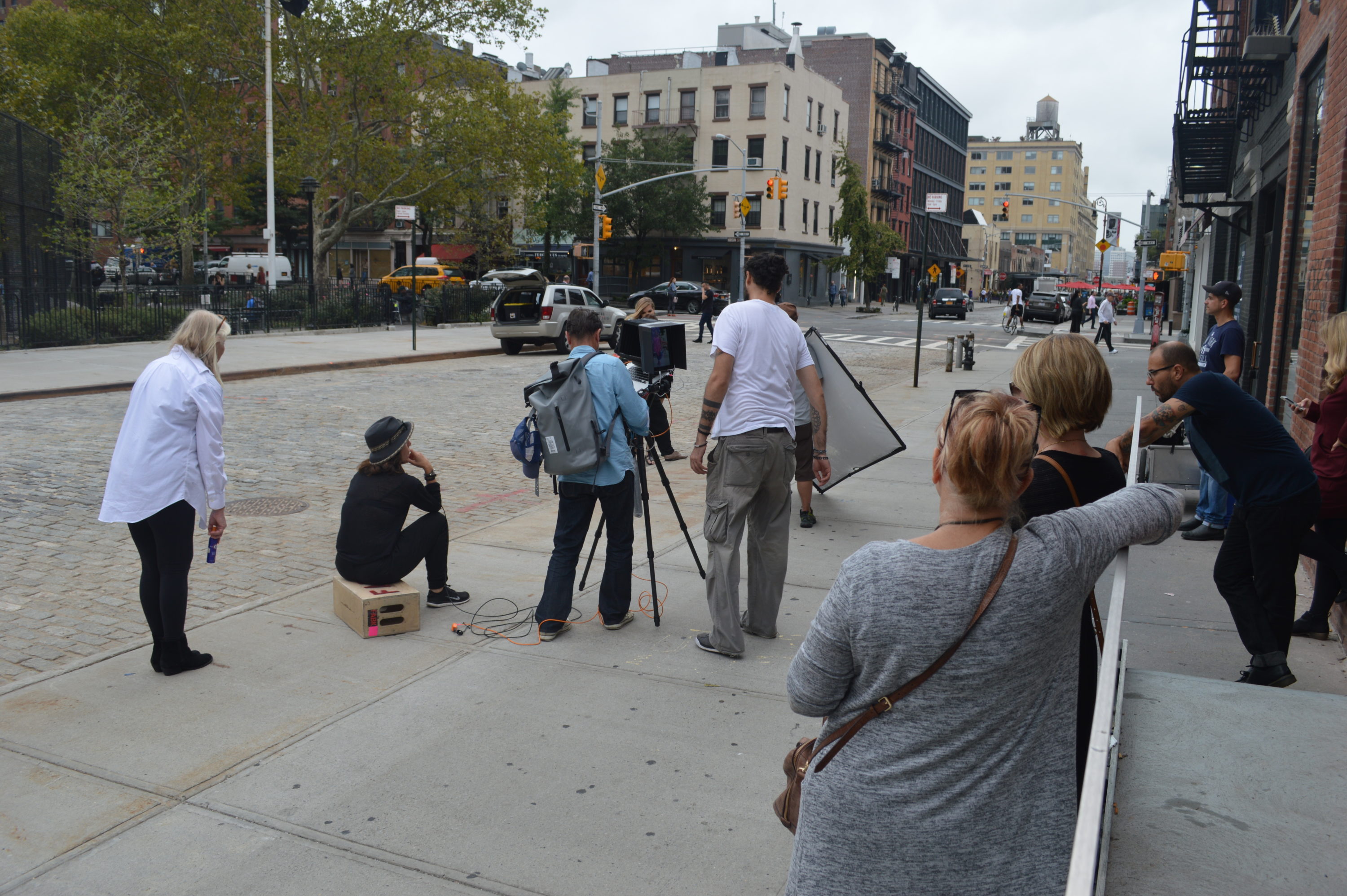 Camera crew filming on the streets