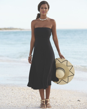 Woman wearing convertible dress as strapless dress