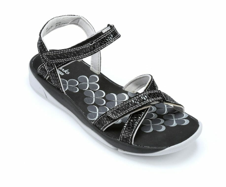 Easy-on adjustable hook-and-loop straps, cushy footbeds and bold colors. 1" heel. Synthetic. Select