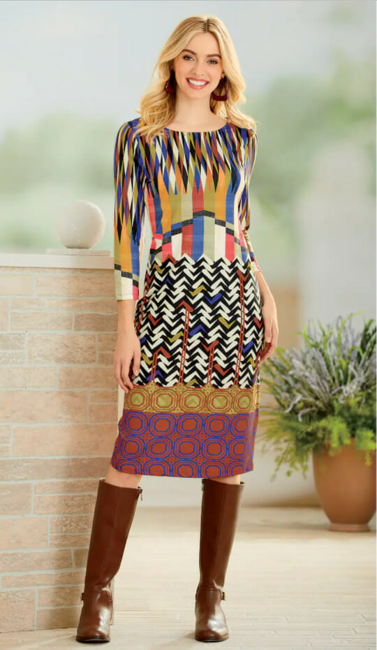 Model posing in printed dress