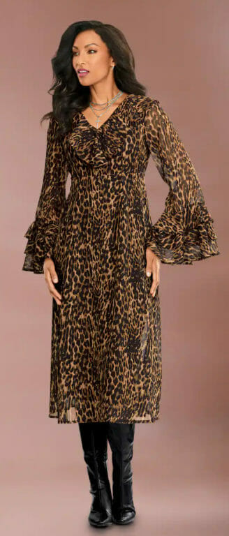 Model in a leopard print dress with flared sleeves and knee-high black boots, posing against a neutral background.