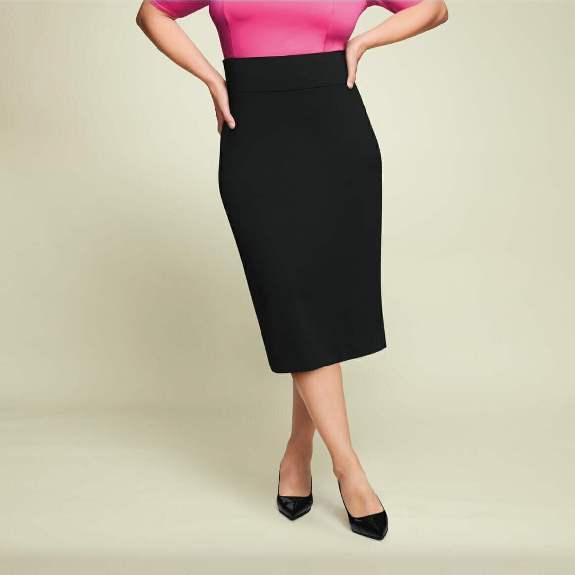 plus size model wearing a black skirt