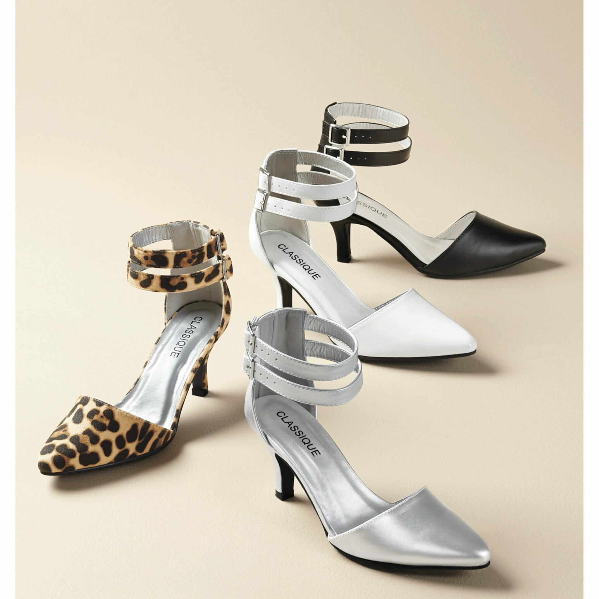Leopard, silver metallic, white patent, and black Classique pump.