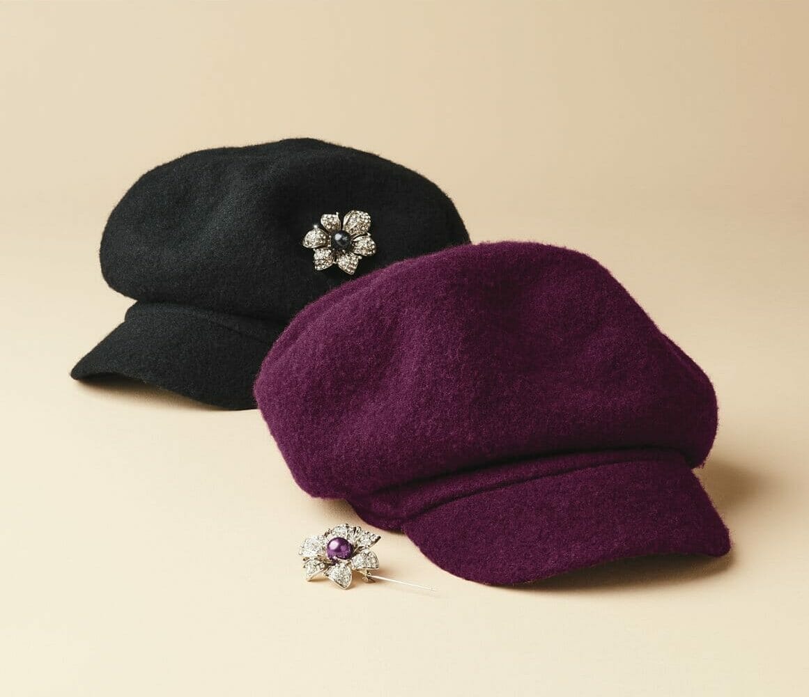Berry and Black Cap with flower brooch.