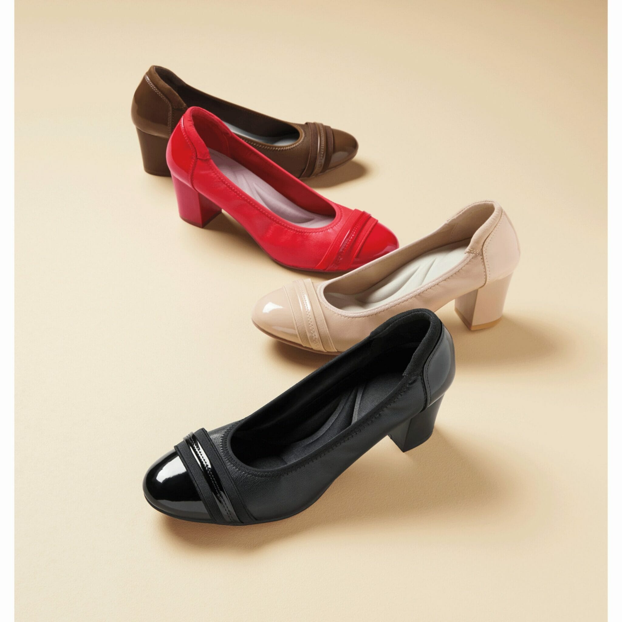 brown, red, tan, and black heel