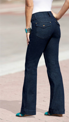 woman wearing turquoise wedged sandals, control top jeans with back flap pockets and white top