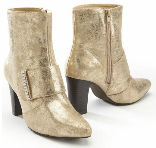 Simple elegance at its most versatile: a sleek profile with rhinestone-trimmed band on these booties. 