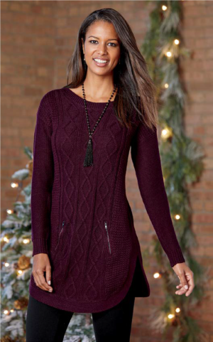 woman in black leggings and burgundy sweater consisting of cable-, rib- and jersey-knit textures