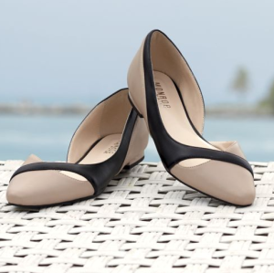 Beige and black flats