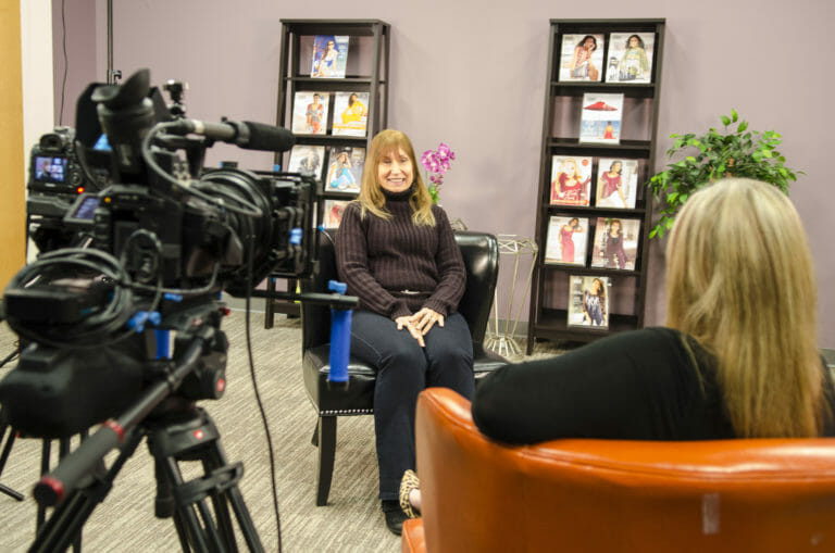 Gail talks with Sue, our Fashion Director while being videotaped about her expectations for the day. 