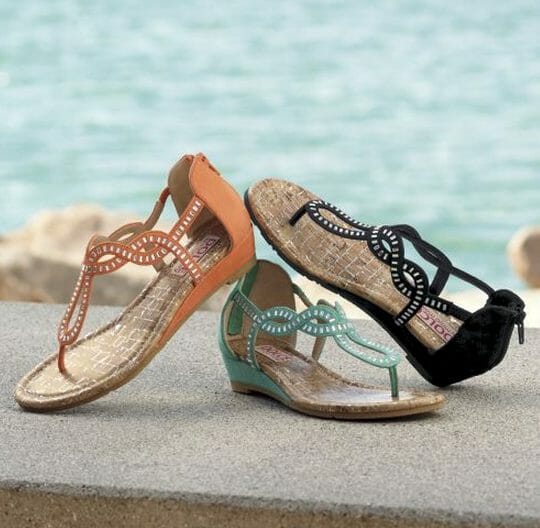 Look for styles with arch support, adjustable straps that keep your feet completely secure, and a big enough sole that your toes or heels aren't hanging off the end.