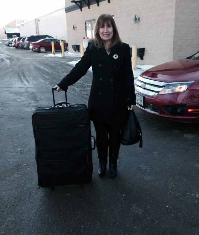 Our sweepstakes winner heading home with a FULL suitcase