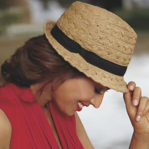 Woman in Box-Weaved Fedora and red blouse