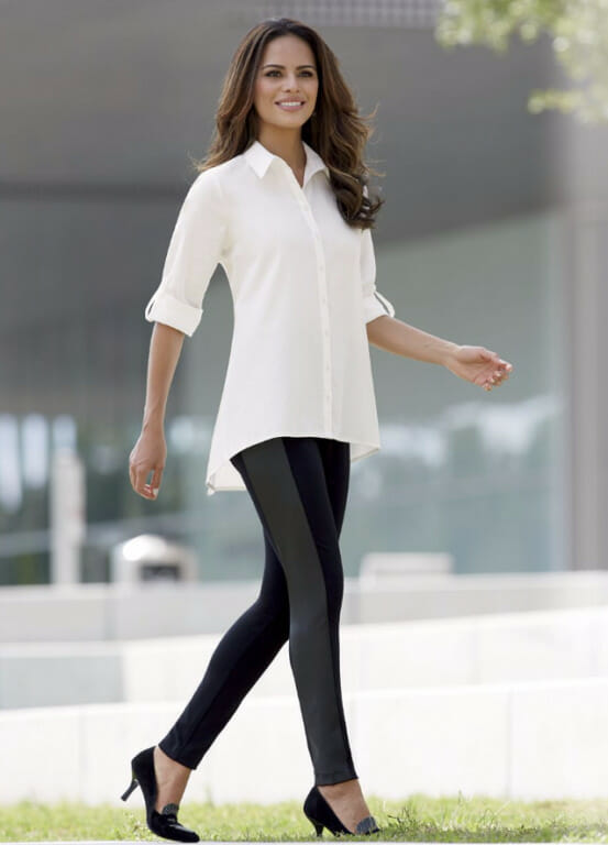 Woman in white blouse, black pants and black shoes