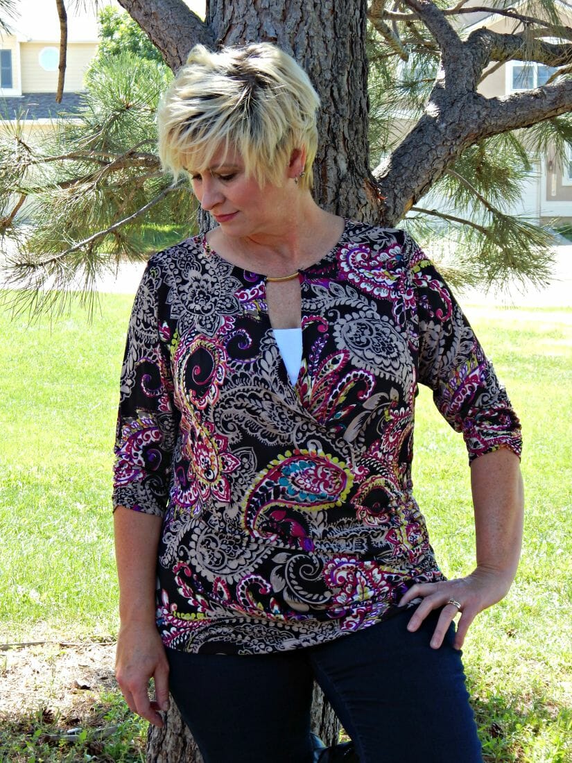 woman wearing a multi-colored top