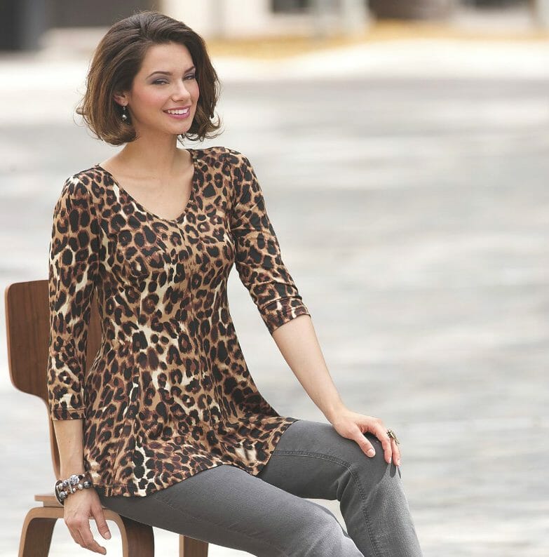 woman wearing a tiger print tunic