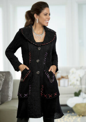 Woman in Button and Lace Trim Black Sweater Coat