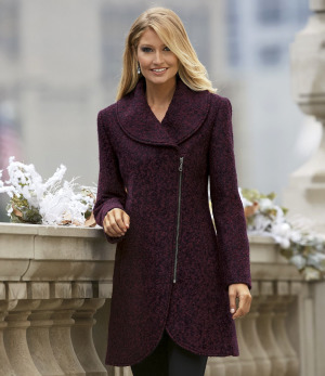 Woman in a berry bouclé coat