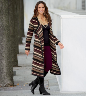Woman wearing Gold Necklaces, black shirt, purple leggings and multi-stripe duster