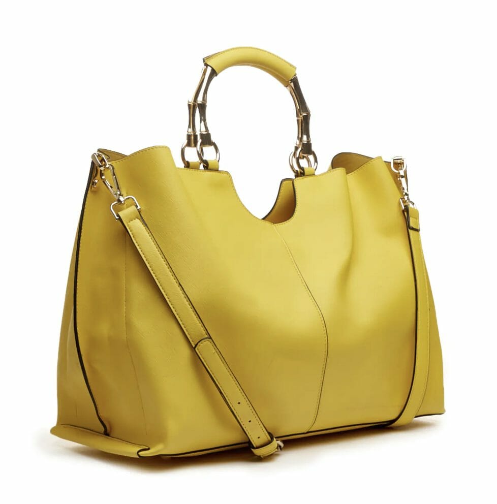Yellow satchel with 3 inside pockets, center zip and adjustable, removable carrying strap