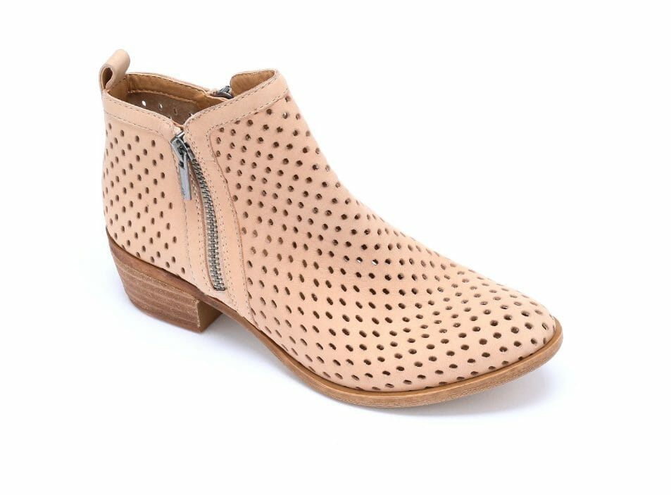 Nubuck leather sports cooling perforated uppers. Outside zip; rear pull loop. 1" heel. Available only in Bisque.
