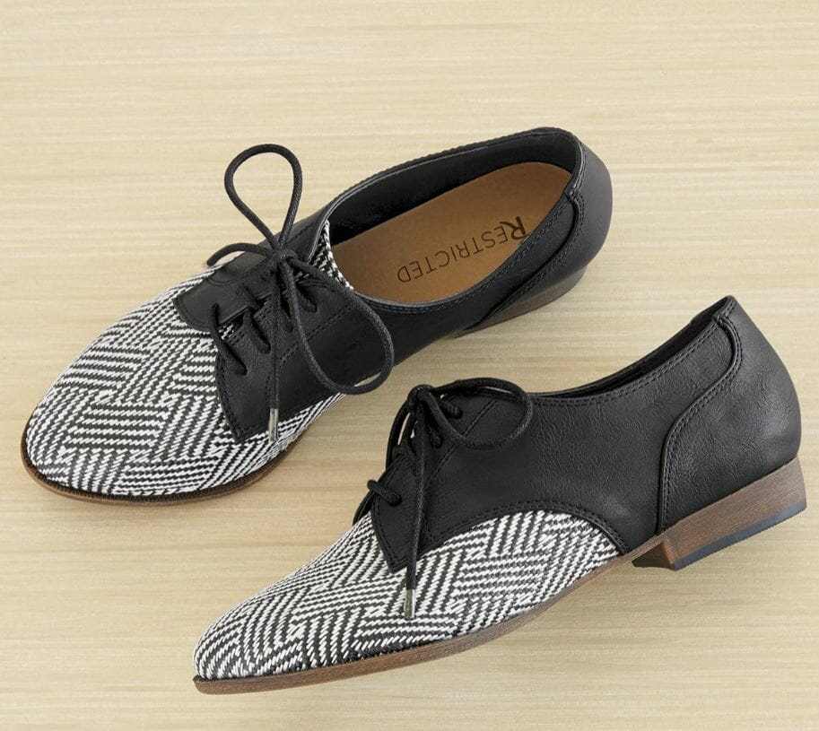 Black and white Oxford shoes