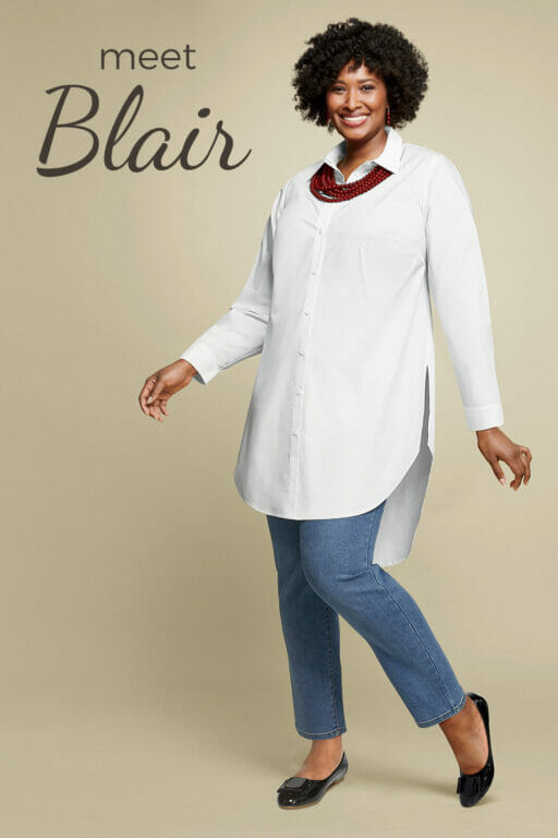 Black female plus-size model wearing a white shirt and jeans
